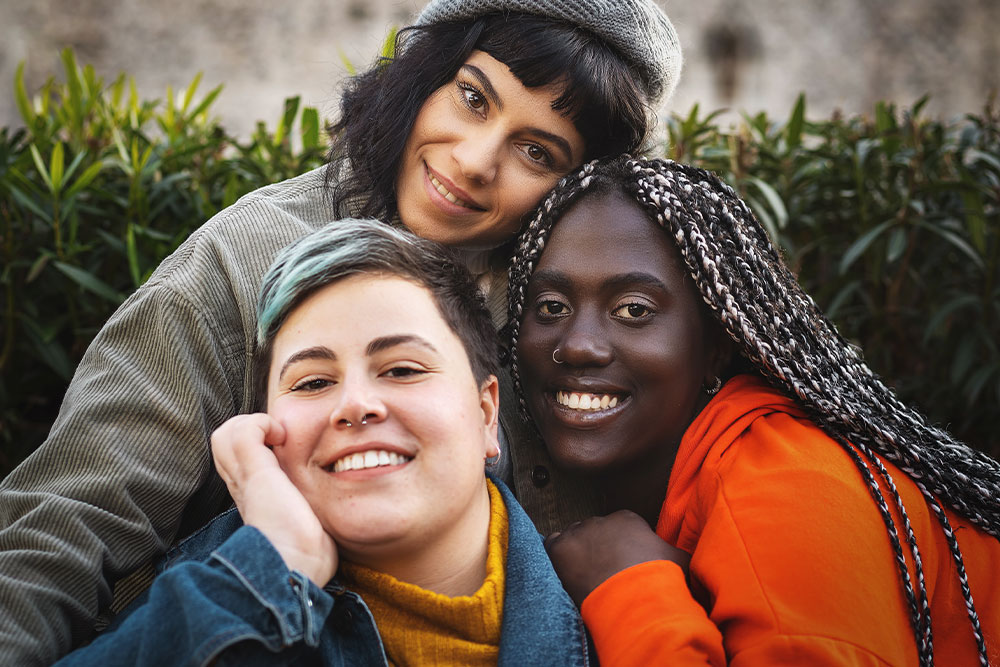 three friends hanging out together