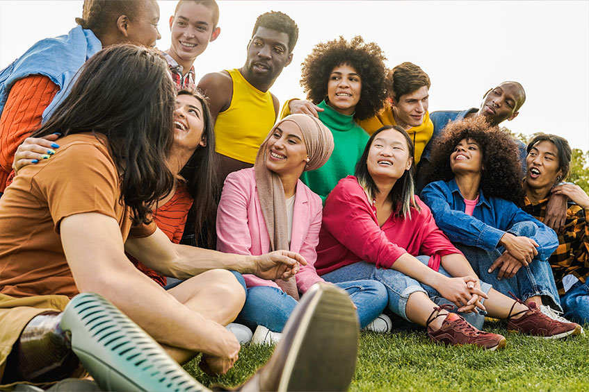 large group of minorities sitting outside